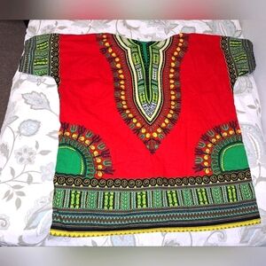 A TIA colorful Dashiki Tunic top. One size fits most. EUC.